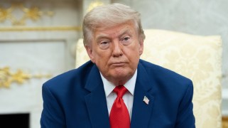 President Trump seated in the Oval Office.