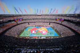 AP26200730989735 Dancers perform as colorful smoke rises above the stadium during the halftime show at the World Cup final soccer match between Spain and Argentina in East Rutherford, N.J., near New York, Sunday, July 19, 2026. (AP Photo/Matt Slocum)