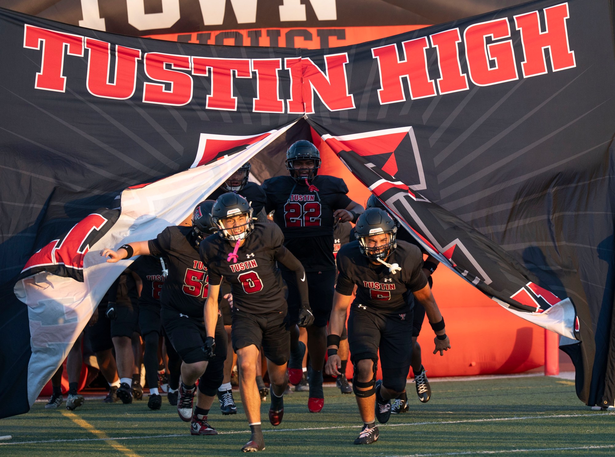 OCR-L-HSFB-SC-TUSTIN-14-0823-01 The Tustin football team takes the field before the start the season-opening football game against San Clemente in Tustin on Friday, Aug. 22, 2025. (Photo by Paul Rodriguez, Contributing Photographer)