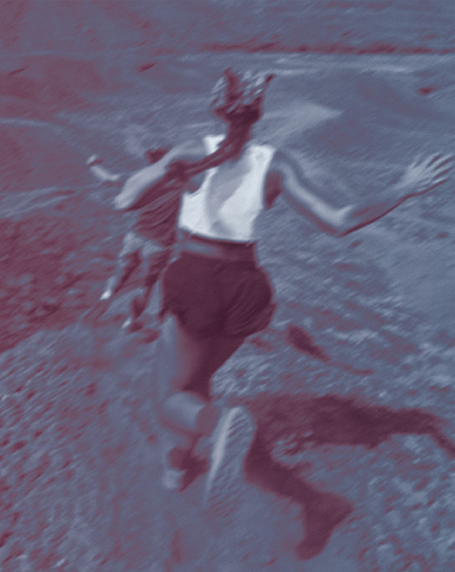Two people trail running through the mountains