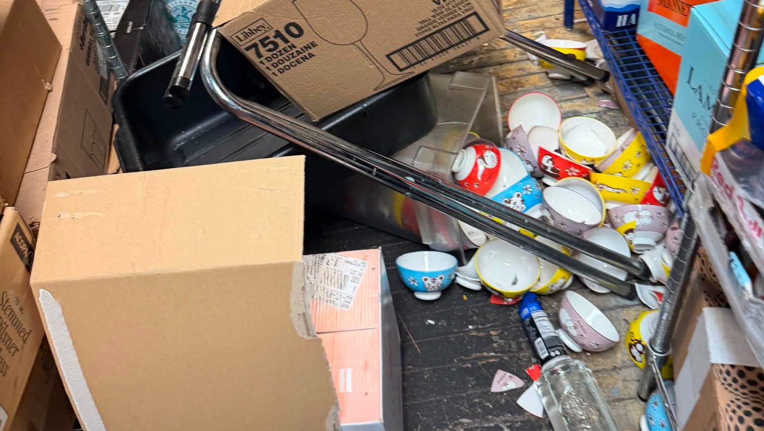 STP-L-GNOME-0818 Boxes and other items scattered about after a burglary.