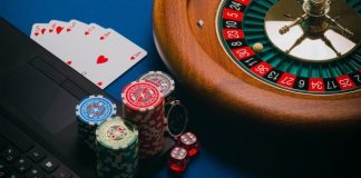 How Table Games Keep Their Classic Feel Inside an Online Casino Lobby playing cards on brown wooden table
