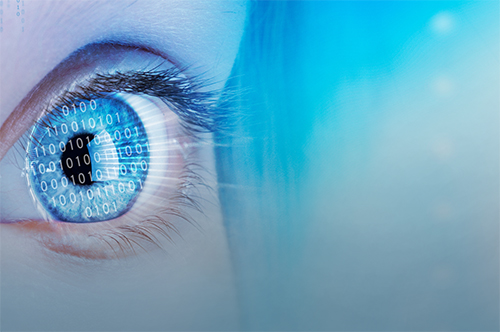 Binary numbers appear on a person's eye
